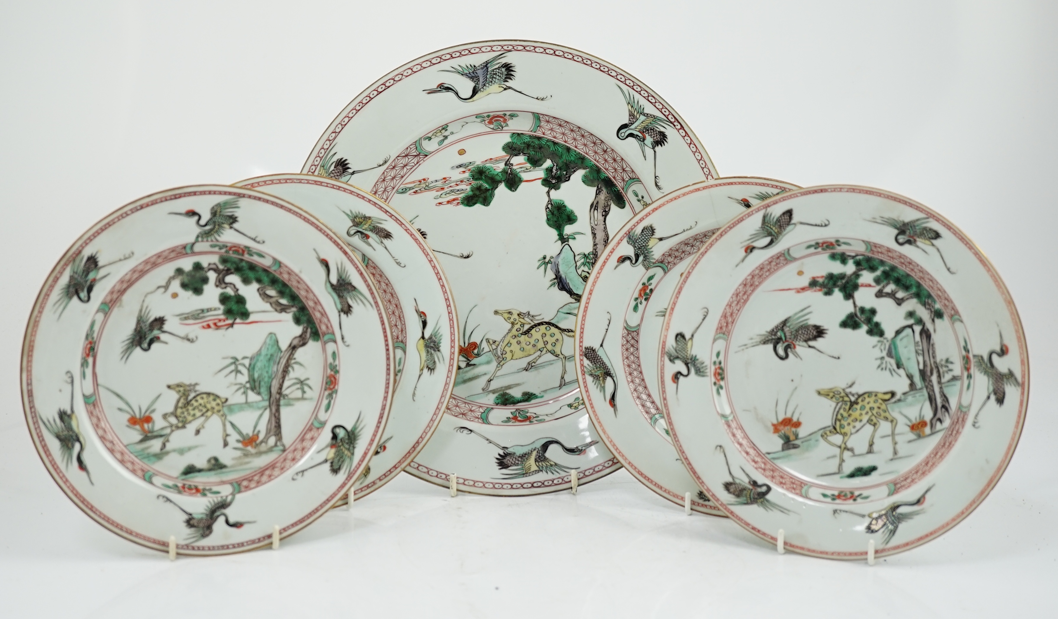 A Chinese famille verte ‘deer and crane’ dish and four matching plates, Kangxi period